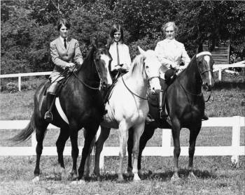 Protégés Ann Yeatts (Lancaster) on Sedgemore, and Sarah Atkinson (Armistead) on B. J., with Bettie Watson on Sport, in the Watson pasture